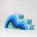 grimm's water waves medium wood stacking blocks colours from largest to smallest: light blue, sky blue, royal blue, navy, turquoise, pale turquoise