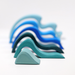 grimm's water waves medium wood stacking blocks colours from largest to smallest: light blue, sky blue, royal blue, navy, turquoise, pale turquoise tunnel
