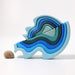 grimm's water waves medium wood stacking blocks colours from largest to smallest: light blue, sky blue, royal blue, navy, turquoise, pale turquoise stacked with small on top of it