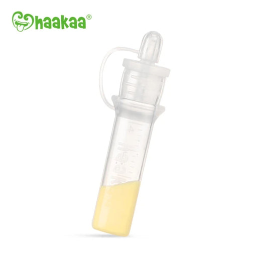 haakaa colostrum collector clear silicone tube with lid, haakaa logo in corner