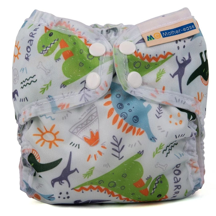 mother ease organic wizard uno all in one cloth diaper dino, light grey background with blue and green dinosaurs, plants, volcanoes, and word roar with white trim, logo on tag, newborn size