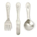 petit cutlery happy face baby cutlery small stainless steel fork, knife, and spoon together in a row